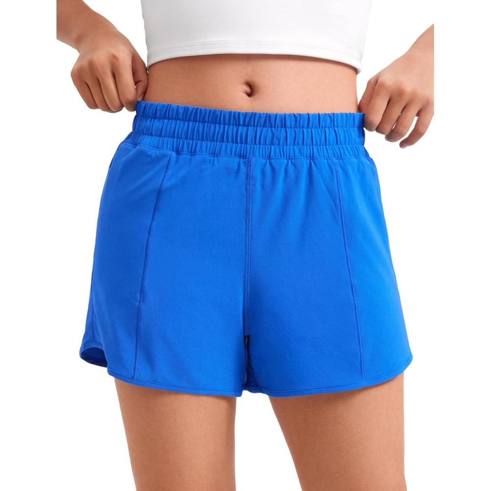 imageCRZ YOGA Girls FeatheryFit Soft Athletic Shorts with Zipper Pocket Tennis Soccer Running Casual Liner Kids TeenSparkle Blue