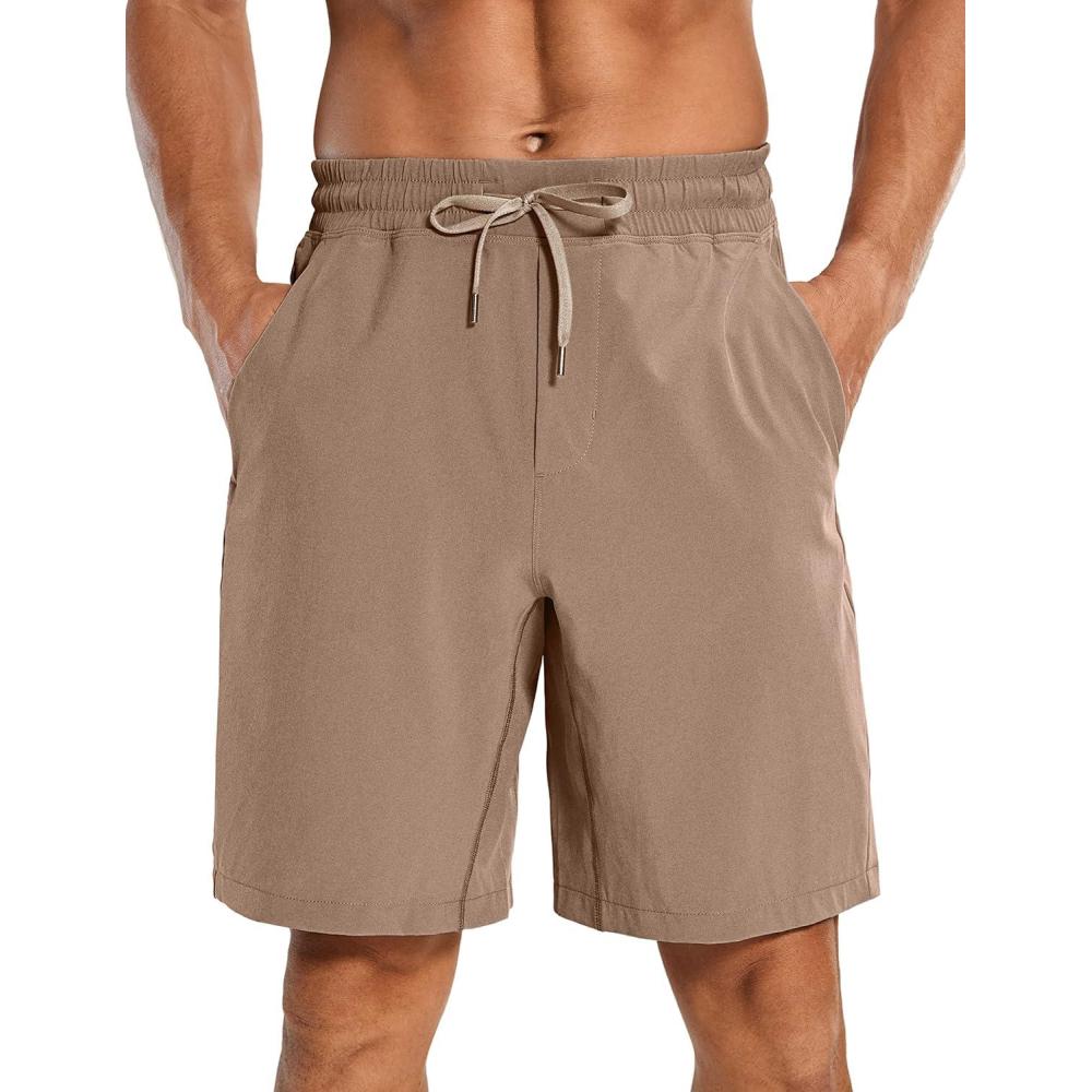 imageCRZ YOGA Mens Linerless Workout Shorts 9 Quick Dry for Running Sports Athletic Gym with PocketsMineral Brown