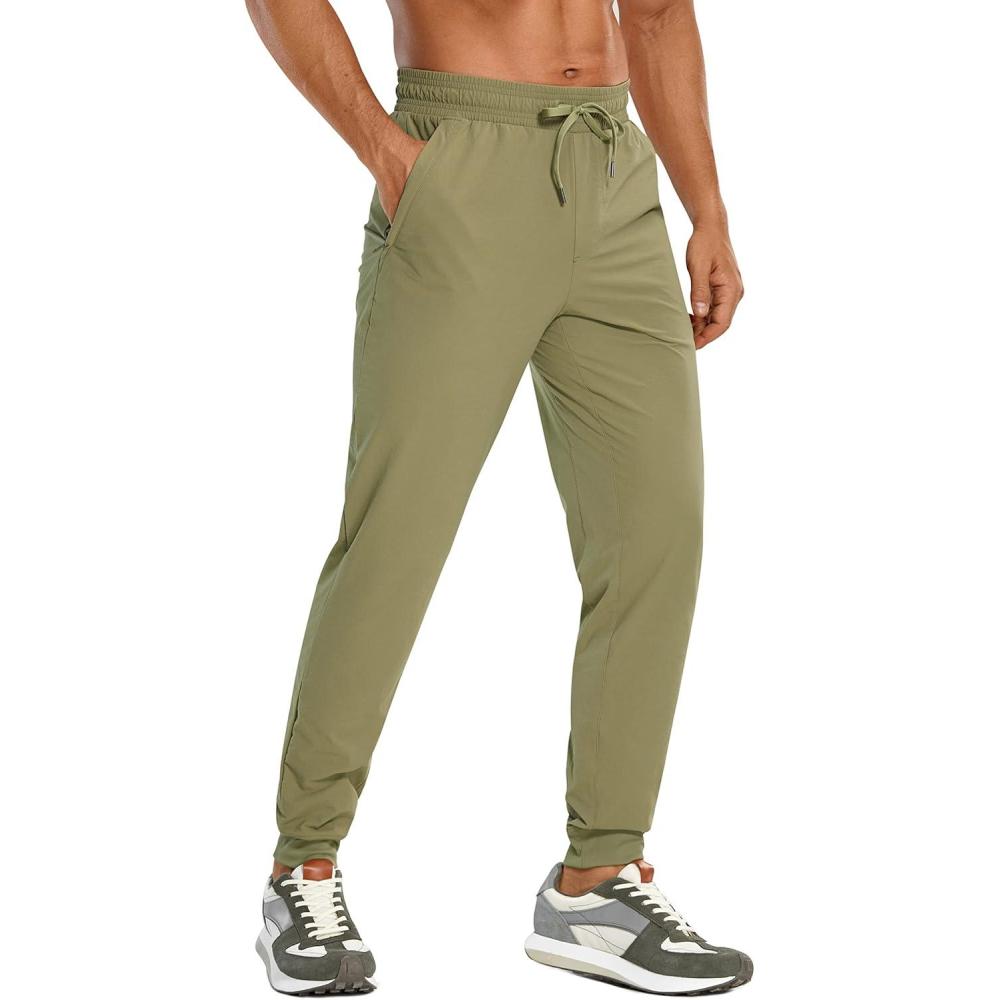 imageCRZ YOGA Stretch Workout Joggers for Men 29quot31quot Lightweight Water Resistant Outdoor Workout Pants with Zip PocketsMoss Green