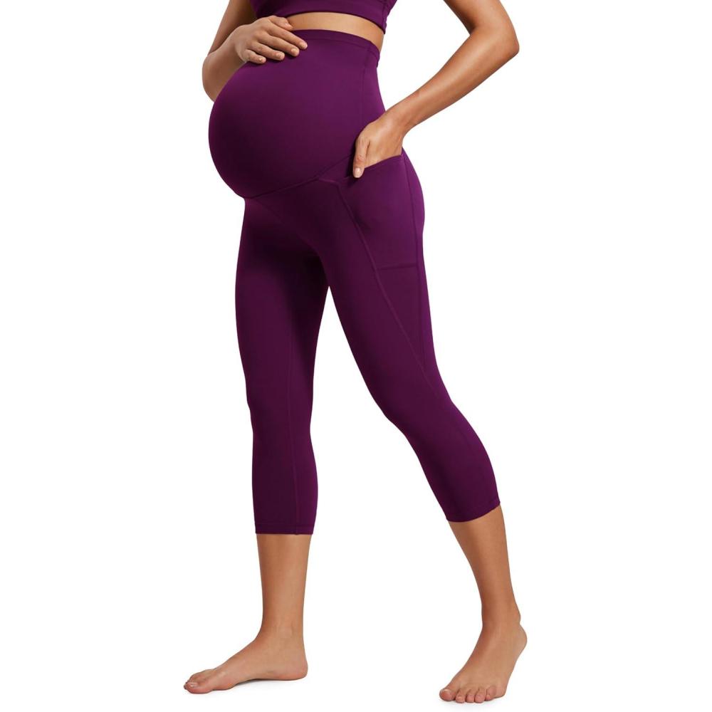 imageCRZ YOGA Womens Butterluxe Maternity Capris Leggings with Pockets 21quot Workout Active Yoga Soft Over The Belly Crop PantsPlum Magenta
