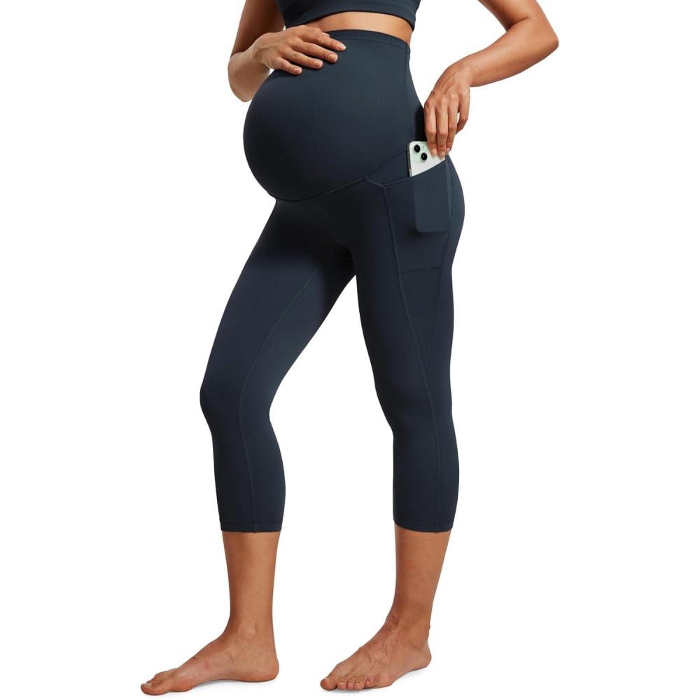 imageCRZ YOGA Womens Butterluxe Maternity Capris Leggings with Pockets 21quot Workout Active Yoga Soft Over The Belly Crop PantsTrue Navy