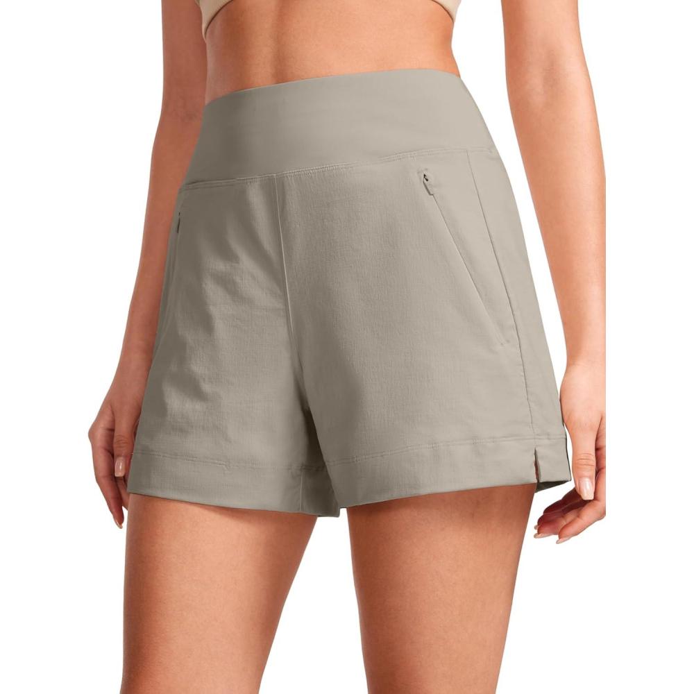 imageCRZ YOGA Womens Lightweight Mid Rise Hiking Shorts 4  Stretch for Athletic Summer Travel Outdoor Golf with Zip PocketsCliff Ash