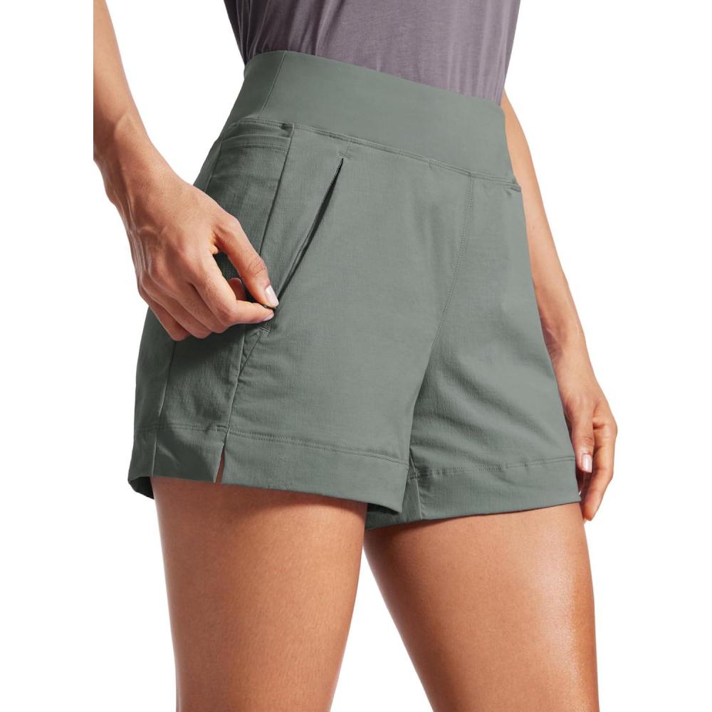imageCRZ YOGA Womens Lightweight Mid Rise Hiking Shorts 4 Stretch for Athletic Summer Travel Outdoor Golf with Zip PocketsGrey Sage