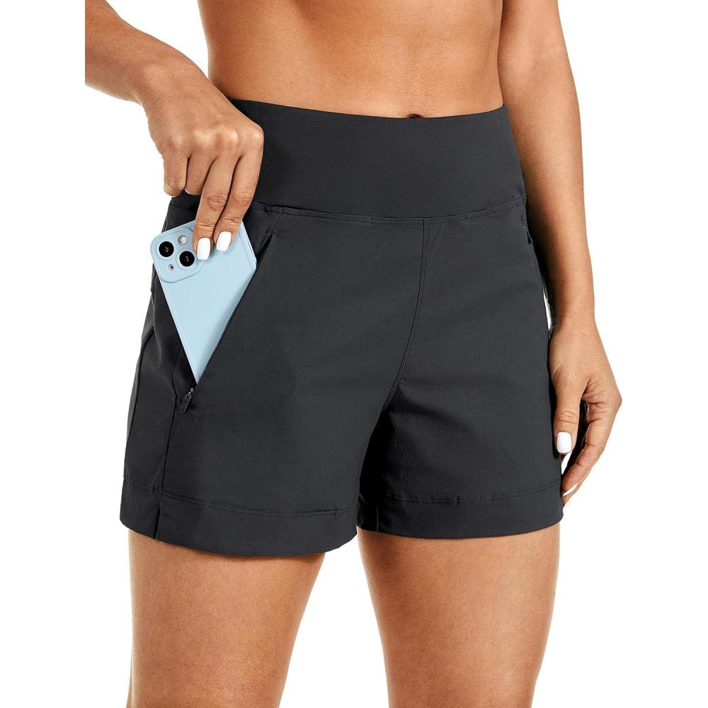 imageCRZ YOGA Womens Lightweight Mid Rise Hiking Shorts 4 Stretch for Athletic Summer Travel Outdoor Golf with Zip PocketsInk Gray