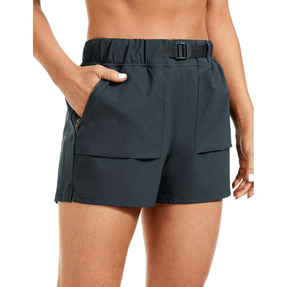 imageCRZ YOGA Womens Waterproof Stretch Hiking Shorts Mid Rise Summer for Outdoor Golf Workout with Zip Pockets Belt  3Melanite