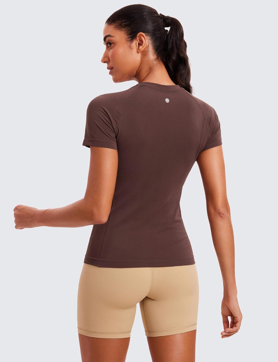 imageCRZ YOGA Seamless Workout Tops for Women Hip Length Athletic Running Gym Yoga Short Sleeve Shirts Breathable Crewneck TeesTaupe