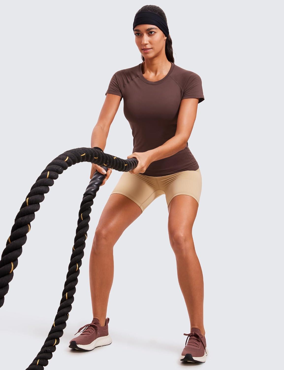 imageCRZ YOGA Seamless Workout Tops for Women Hip Length Athletic Running Gym Yoga Short Sleeve Shirts Breathable Crewneck TeesTaupe