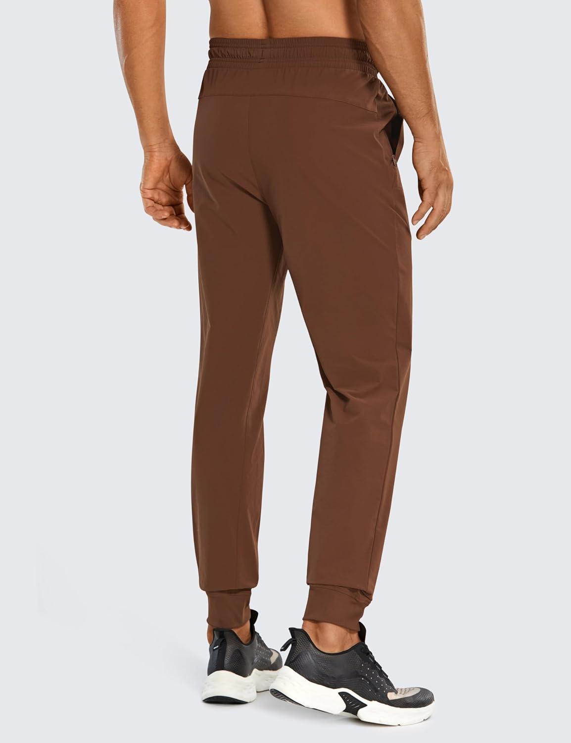 imageCRZ YOGA Stretch Workout Joggers for Men 29quot31quot Lightweight Water Resistant Outdoor Workout Pants with Zip PocketsDark Brown